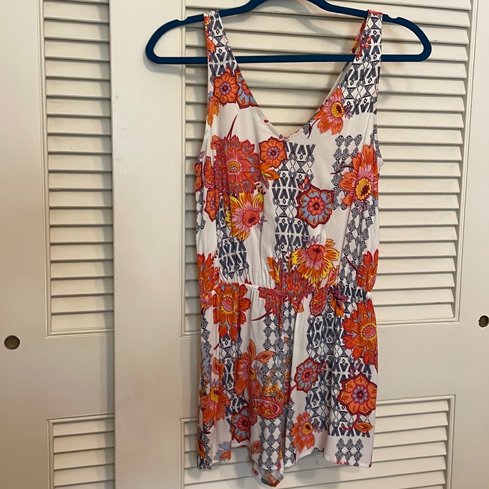Aqua romper. Floral.